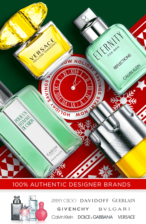 Giftable fragrances sit on a holiday background during the start of Christmas deals